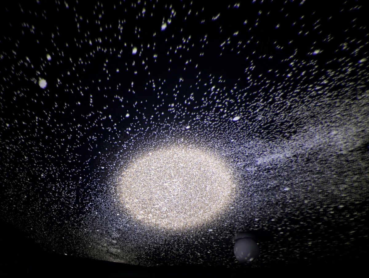 Glowing sun projected on a ceiling