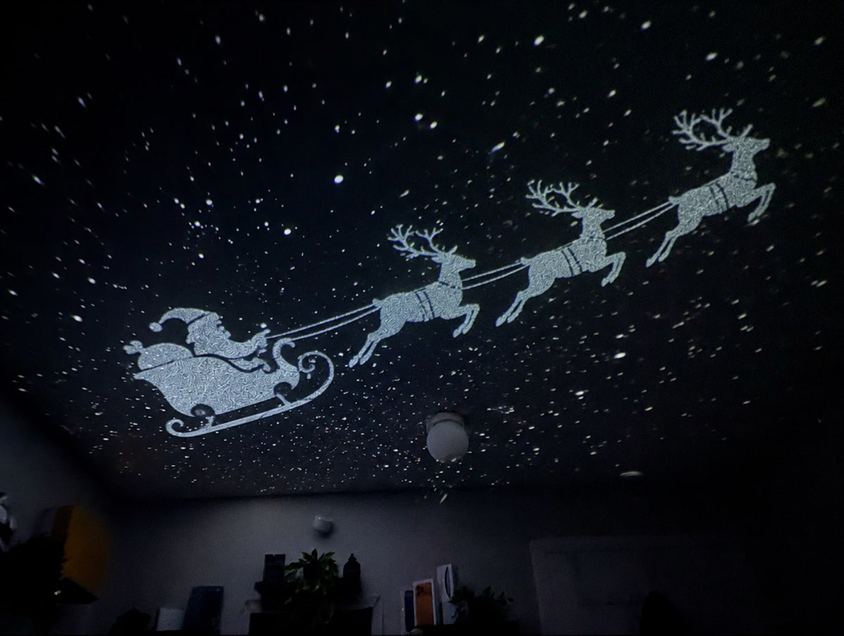 Santa sleigh Christmas film projected on a ceiling